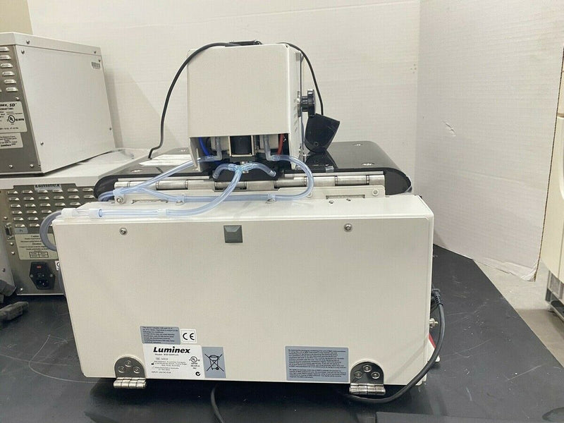 Luminex BSD 600 Plus Sample Media Puncher with 3X Bio-Rad Bio-Plex HTF System SD